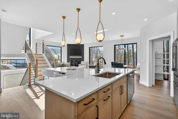a kitchen with a stove and a refrigerator