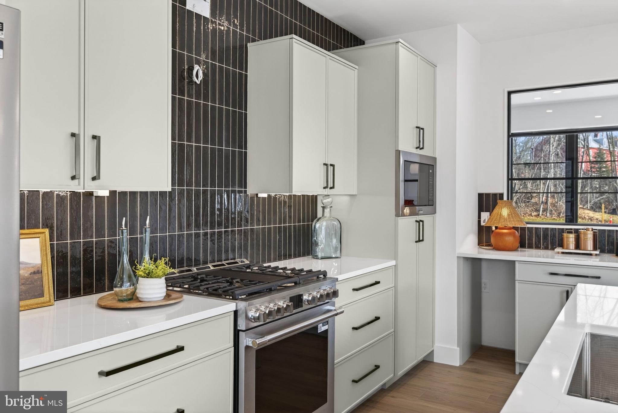 Anvil Model Lot #4 Anvil Model, Unit 4 Womelsdorf, PA 19567 - Photo 16 of 68 Sleek modern kitchen with stylish accents.