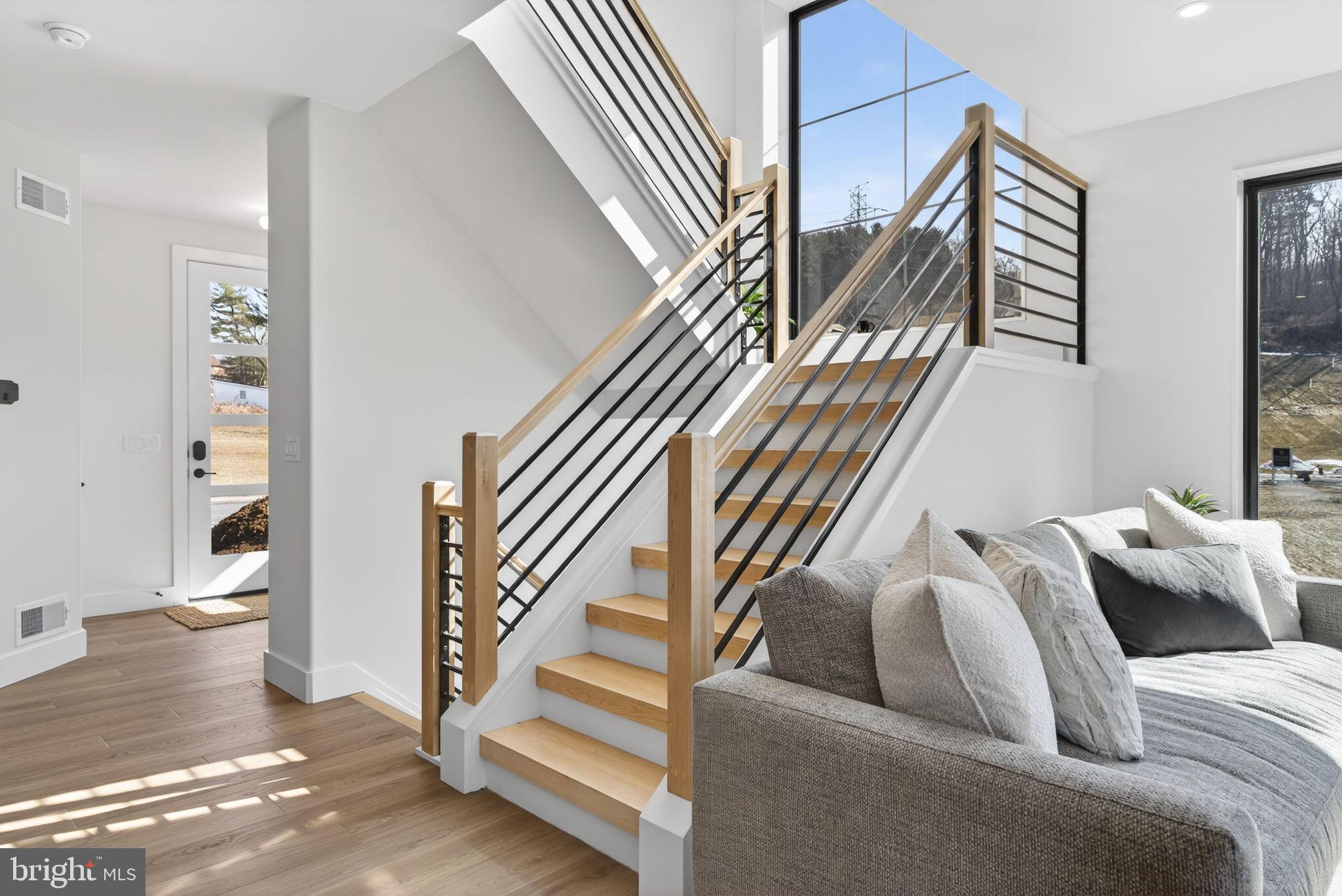 Anvil Model Lot #4 Anvil Model, Unit 4 Womelsdorf, PA 19567 - Photo 33 of 68 Modern staircase with natural light.