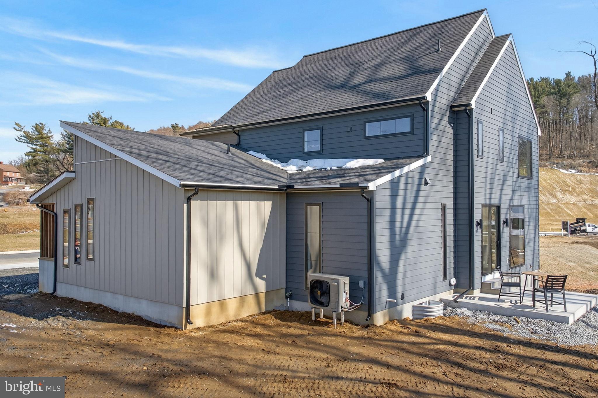 Anvil Model Lot #4 Anvil Model, Unit 4 Womelsdorf, PA 19567 - Photo 67 of 68 Modern home with sleek design and landscape.