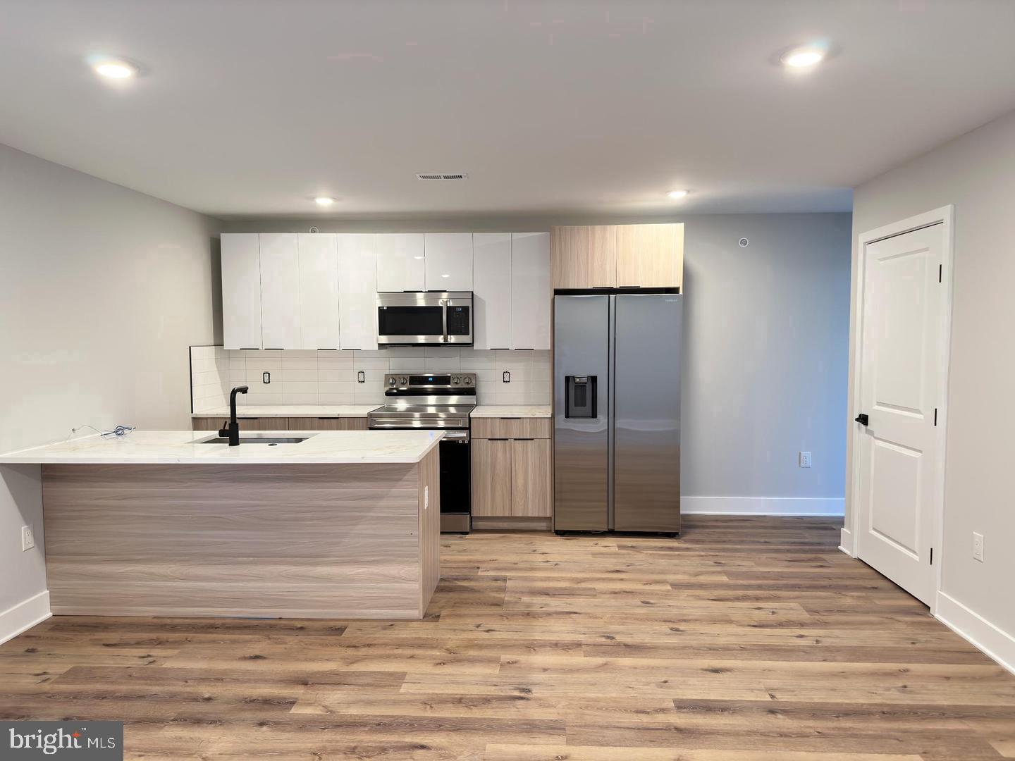 1720 Master Street, Unit 1 Philadelphia, PA 19121 - Photo 2 of 10 Modern kitchen with sleek finishes.