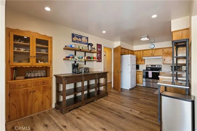 a bathroom with a sink toilet and a mirror
