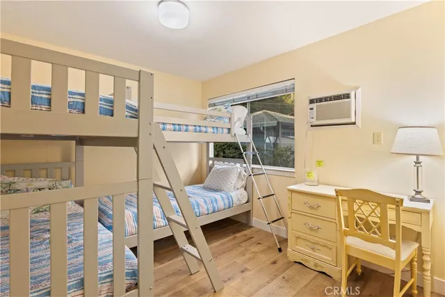 a view of house with swimming pool outdoor seating