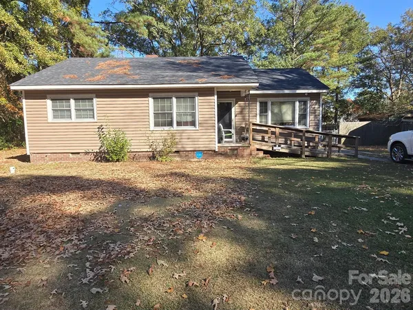 a front view of a house with yard porch and patio