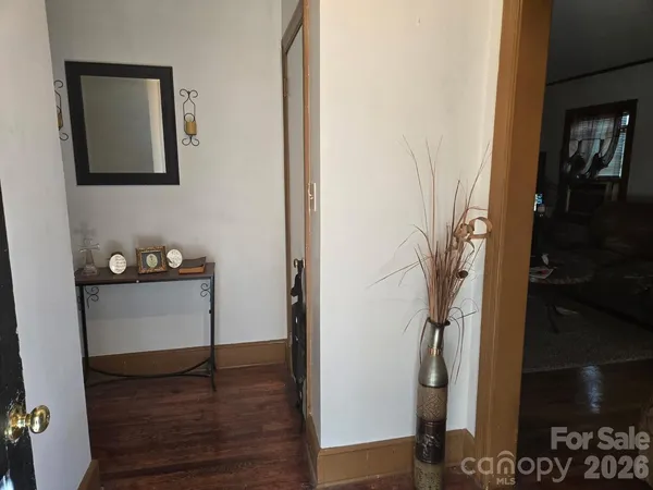 a view of entryway with wooden floor