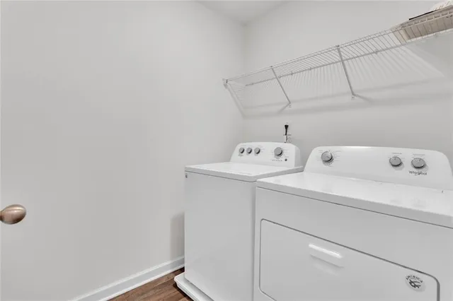 a utility room with dryer and washer