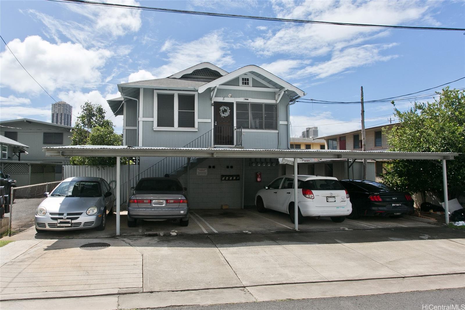 a car parked in front of a house