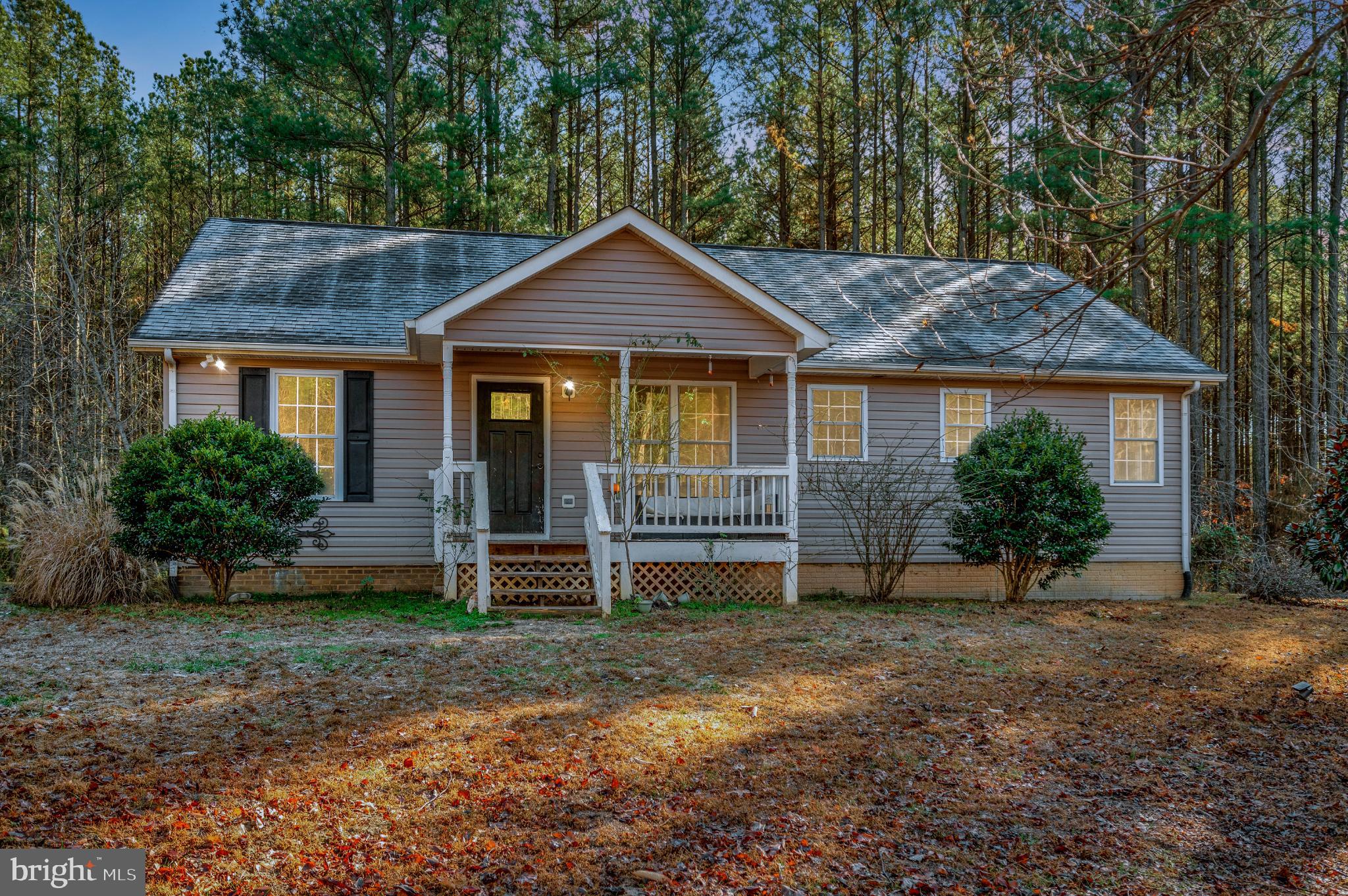 Charming home nestled among serene woods.