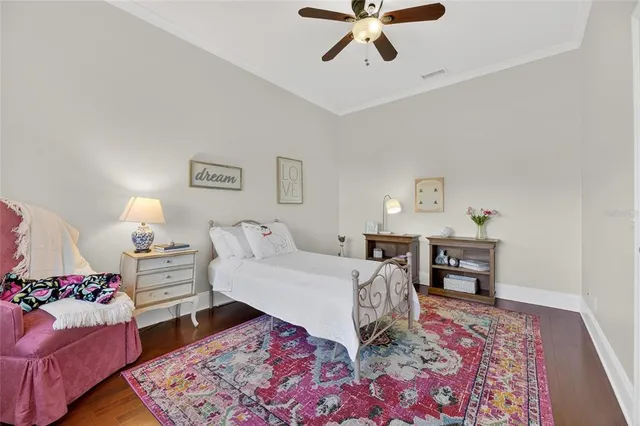 a spacious bathroom with a granite countertop tub a sink and a large mirror