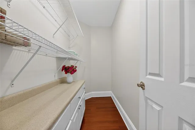 a white toilet sitting next to a bathroom sink