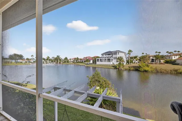 a view of a dinning table and chairs in the patio
