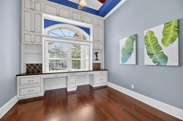 a kitchen with stainless steel appliances granite countertop a stove refrigerator and a sink