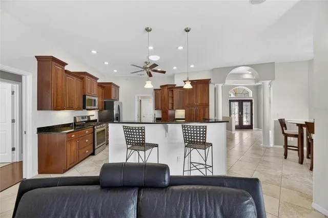a view of a dining room with furniture window and outside view