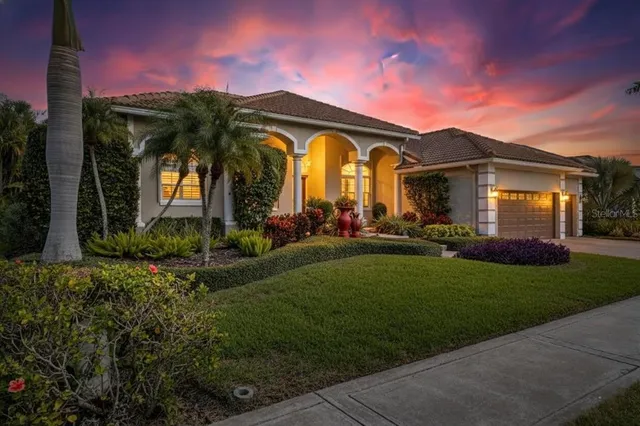 a front view of house with an garden and entertaining space