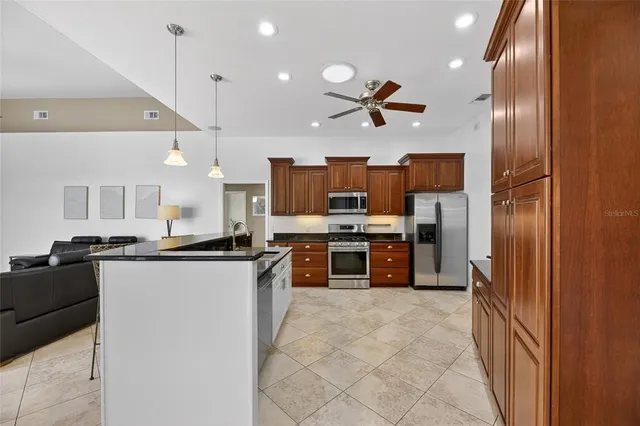an aerial view of a house with a garden