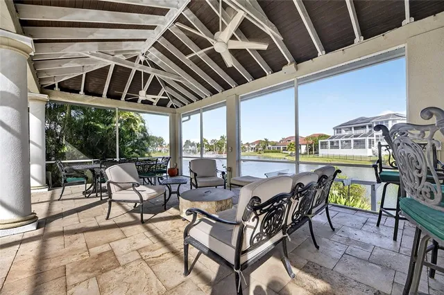 a view of a swimming pool with a lounge chair