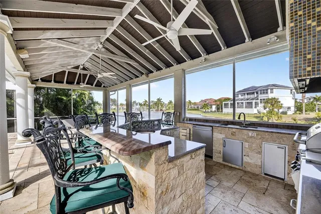 a view of swimming pool with chairs