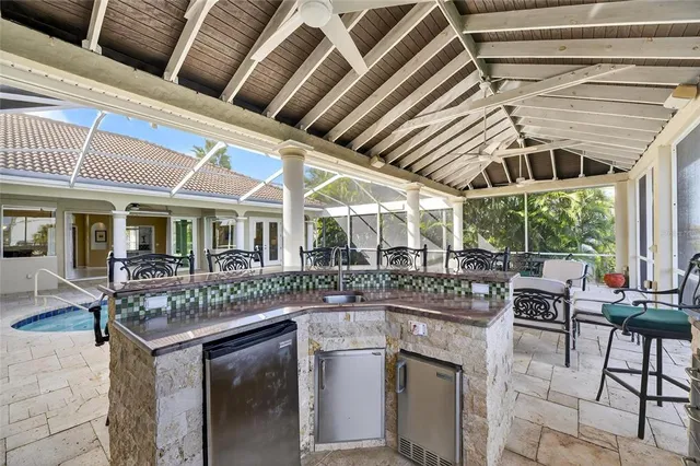 a view of a house with backyard and entertaining space