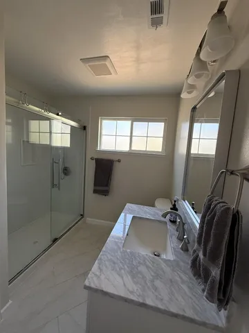 a view of a hallway with workspace