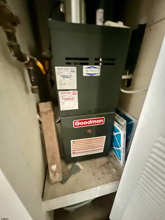 a view of a house with a backyard and sitting area