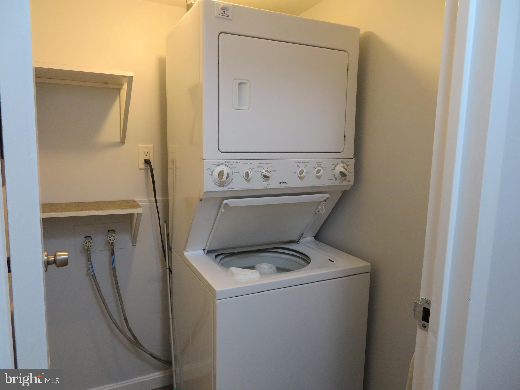 11236 Chestnut Grove Square, Unit 261 Reston, VA 20190 - Photo 23 of 30 a bathroom with a sink and a mirror