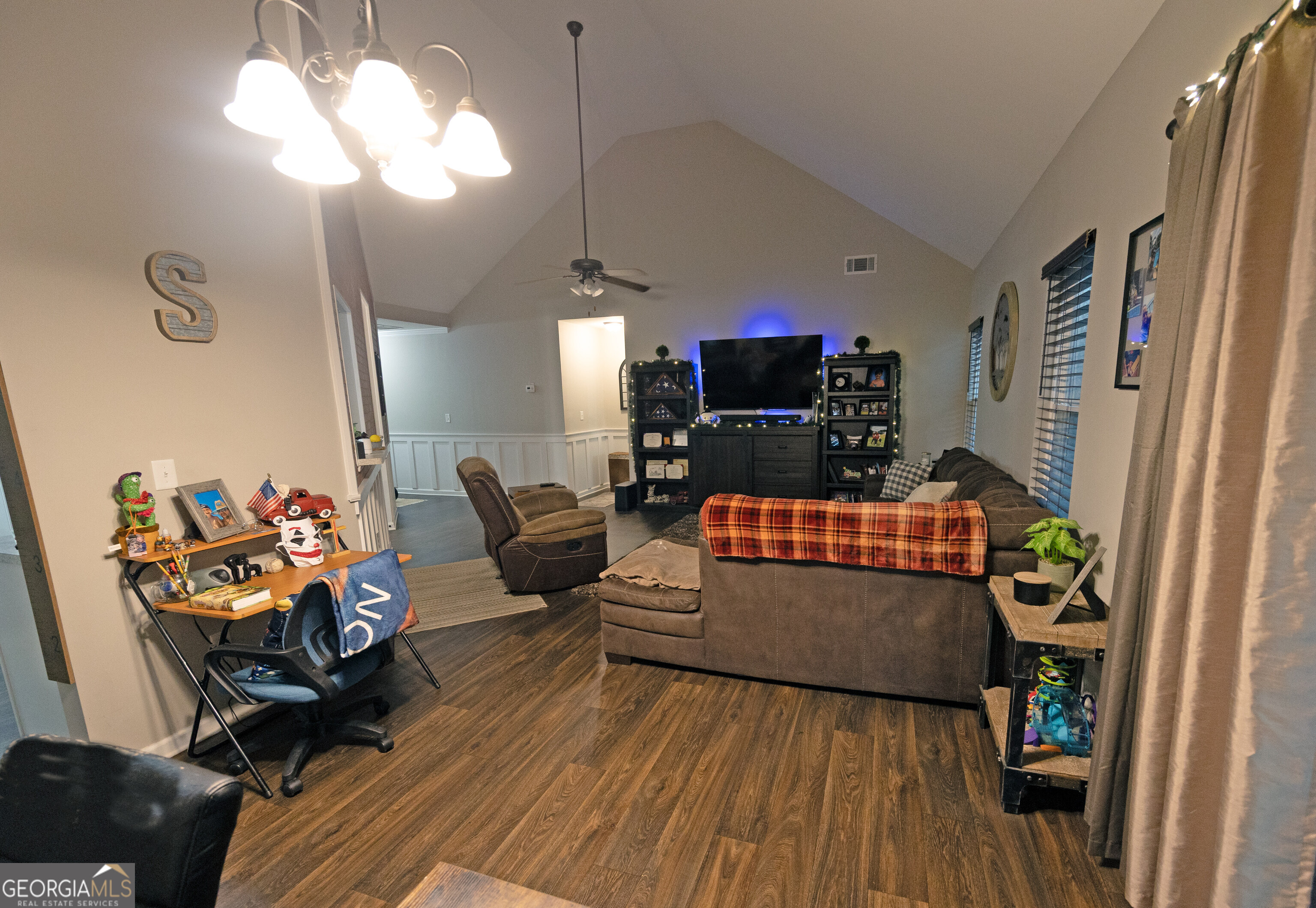 104 Savannah Way Milner, GA 30257 - Photo 14 of 27 a living room with furniture fireplace and a flat screen tv