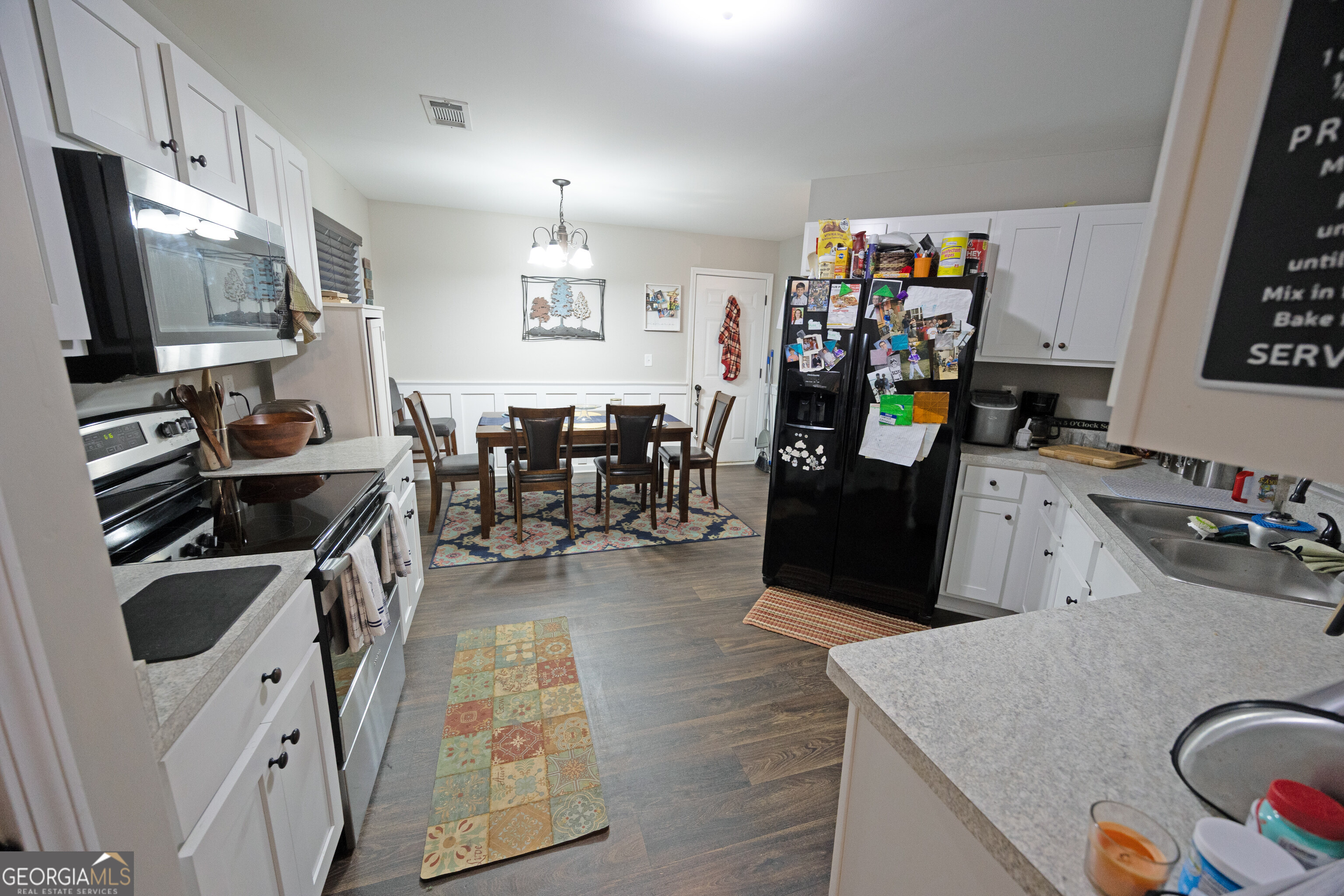 104 Savannah Way Milner, GA 30257 - Photo 18 of 27 a kitchen with lots of counter top space