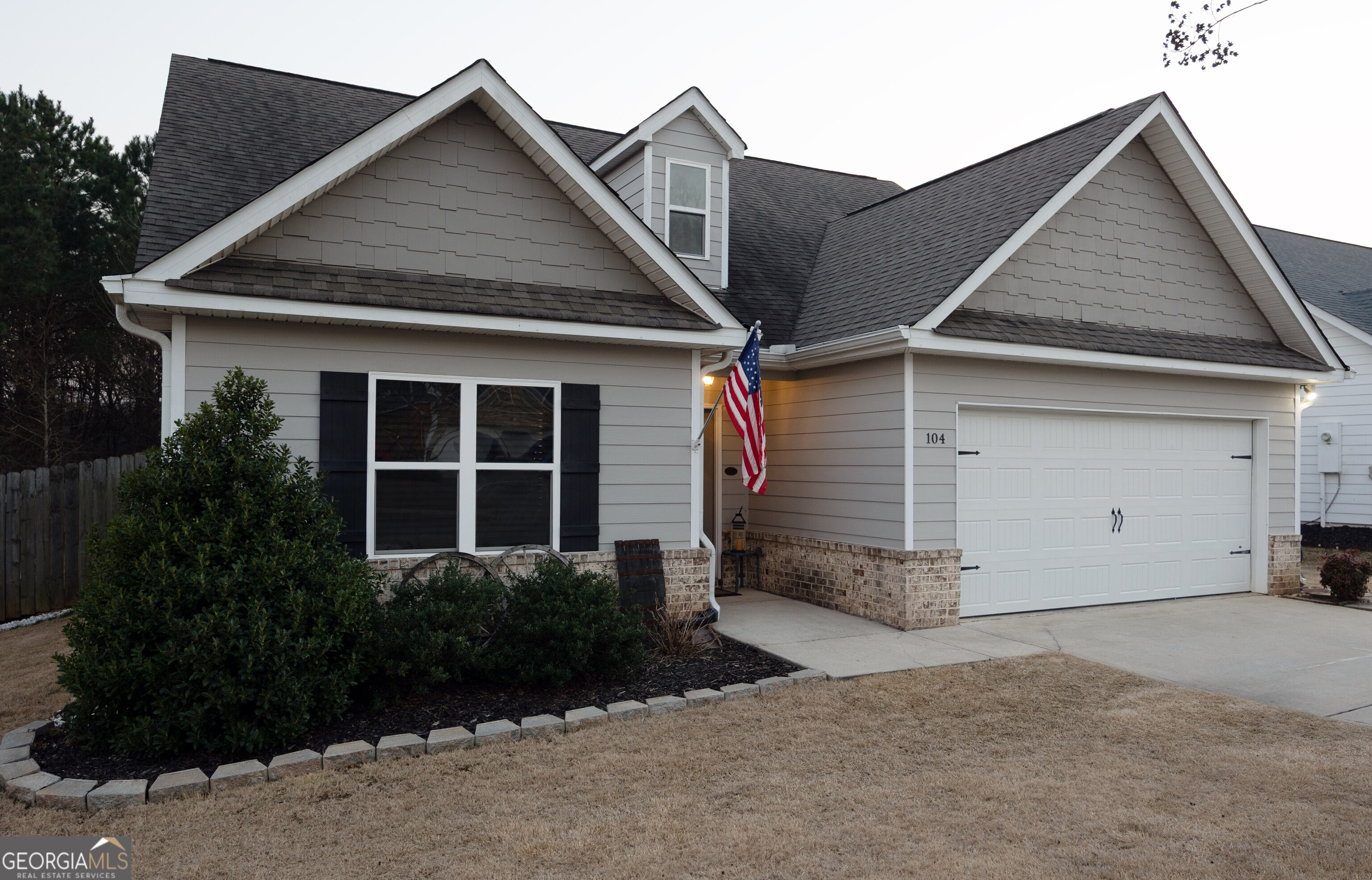 104 Savannah Way Milner, GA 30257 - Photo 2 of 27 a view of house with garden