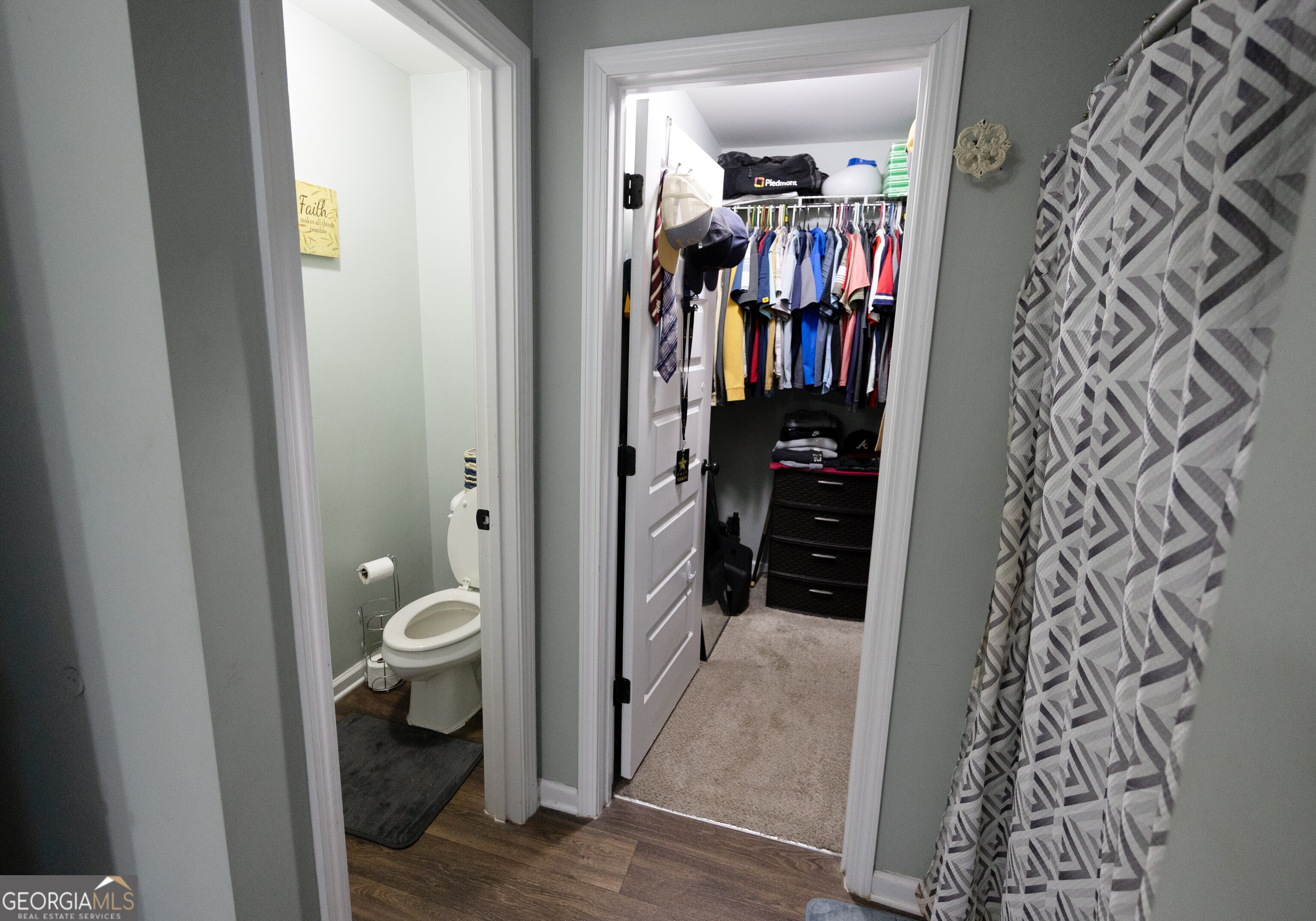 104 Savannah Way Milner, GA 30257 - Photo 25 of 27 a view of a walk in closet