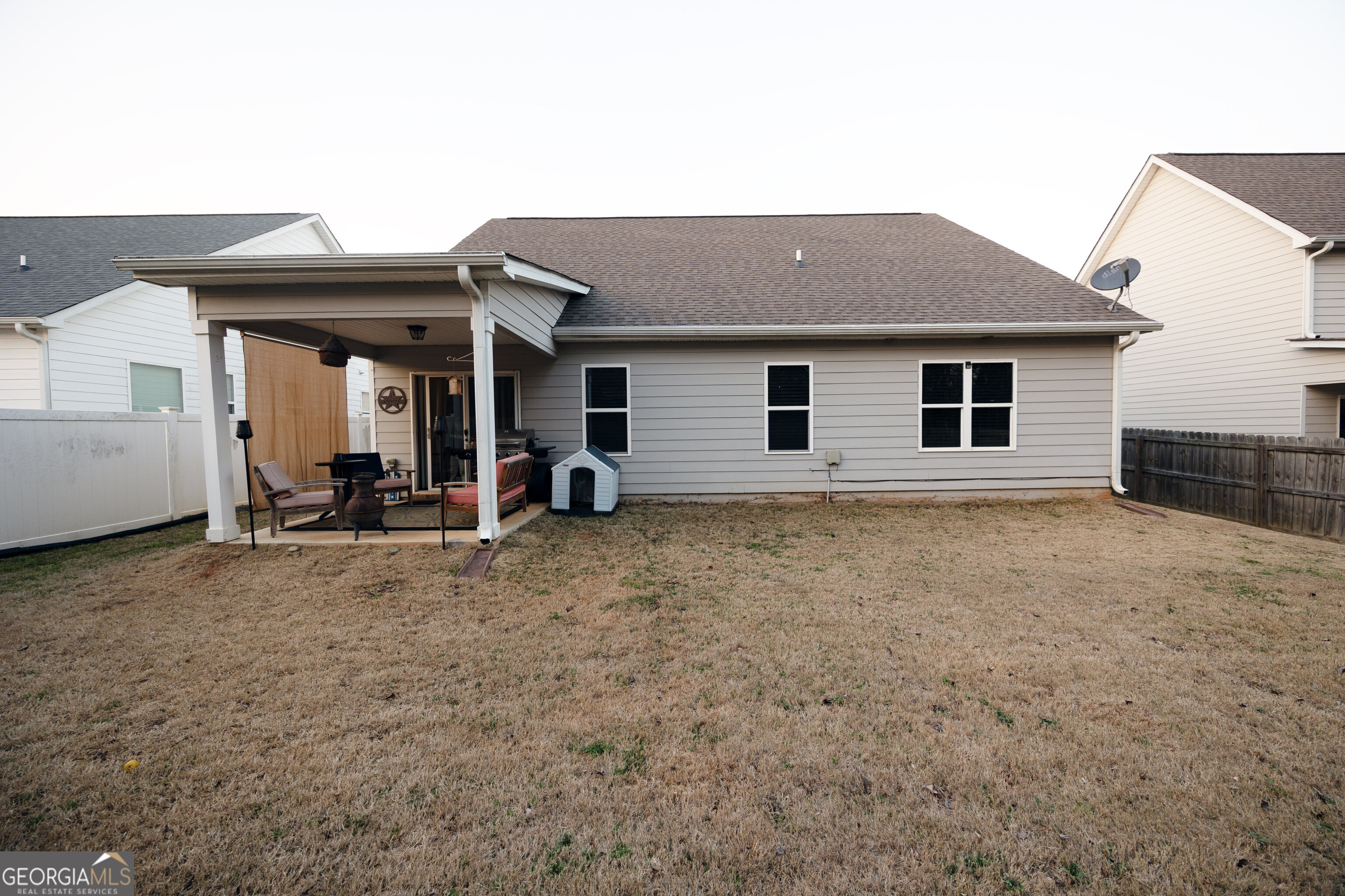 104 Savannah Way Milner, GA 30257 - Photo 26 of 27 a view of a house with wooden fence
