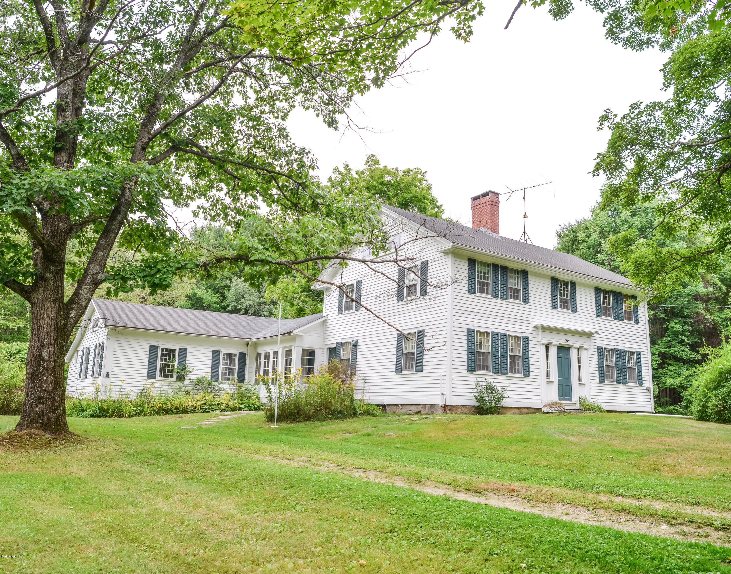 191 North Beech Plain Road Sandisfield, MA 01255 - Photo 1 of 54 a front view of a house with a garden