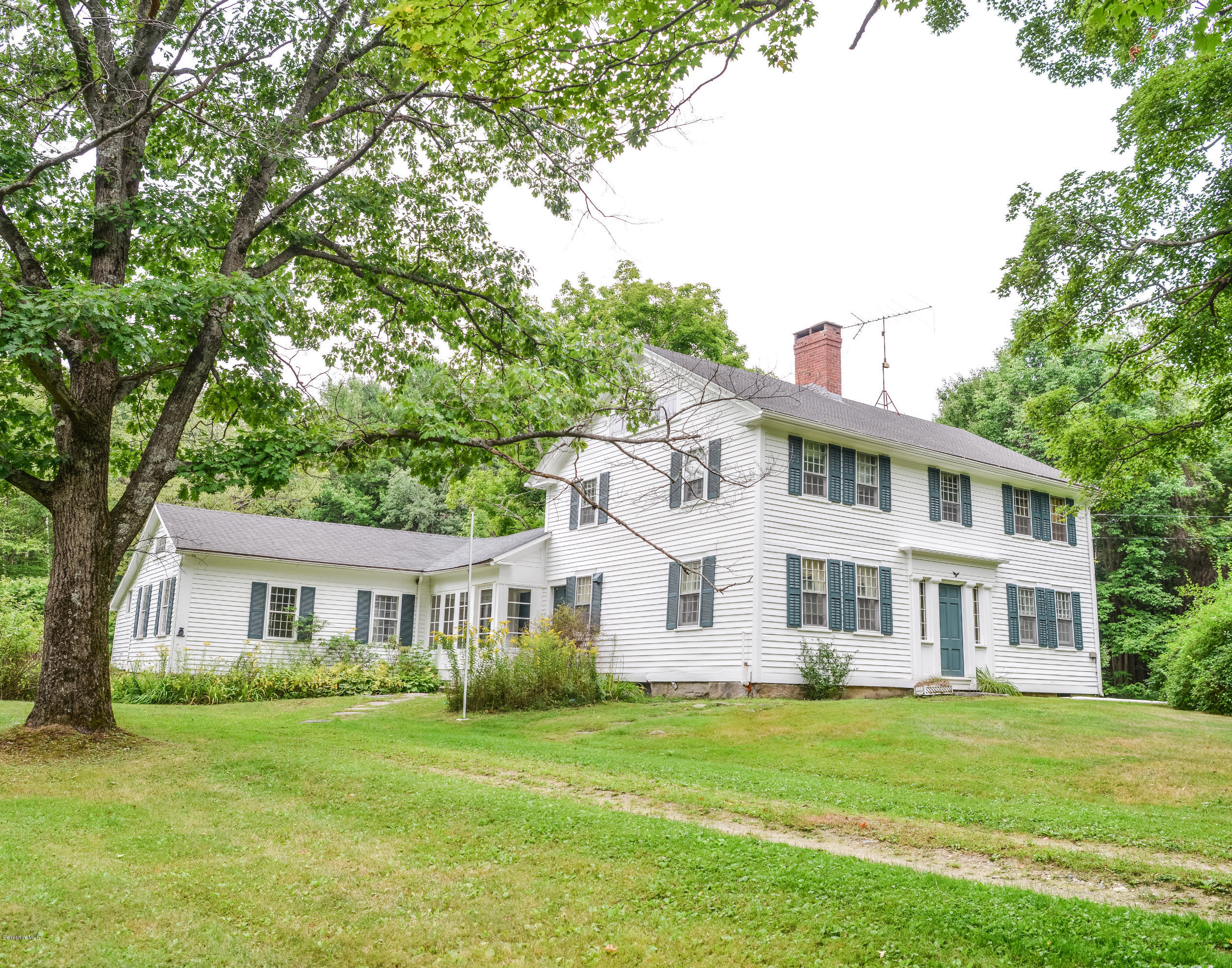 191 North Beech Plain Road Sandisfield, MA 01255 - Photo 2 of 54 a view of a house with a big yard and large trees