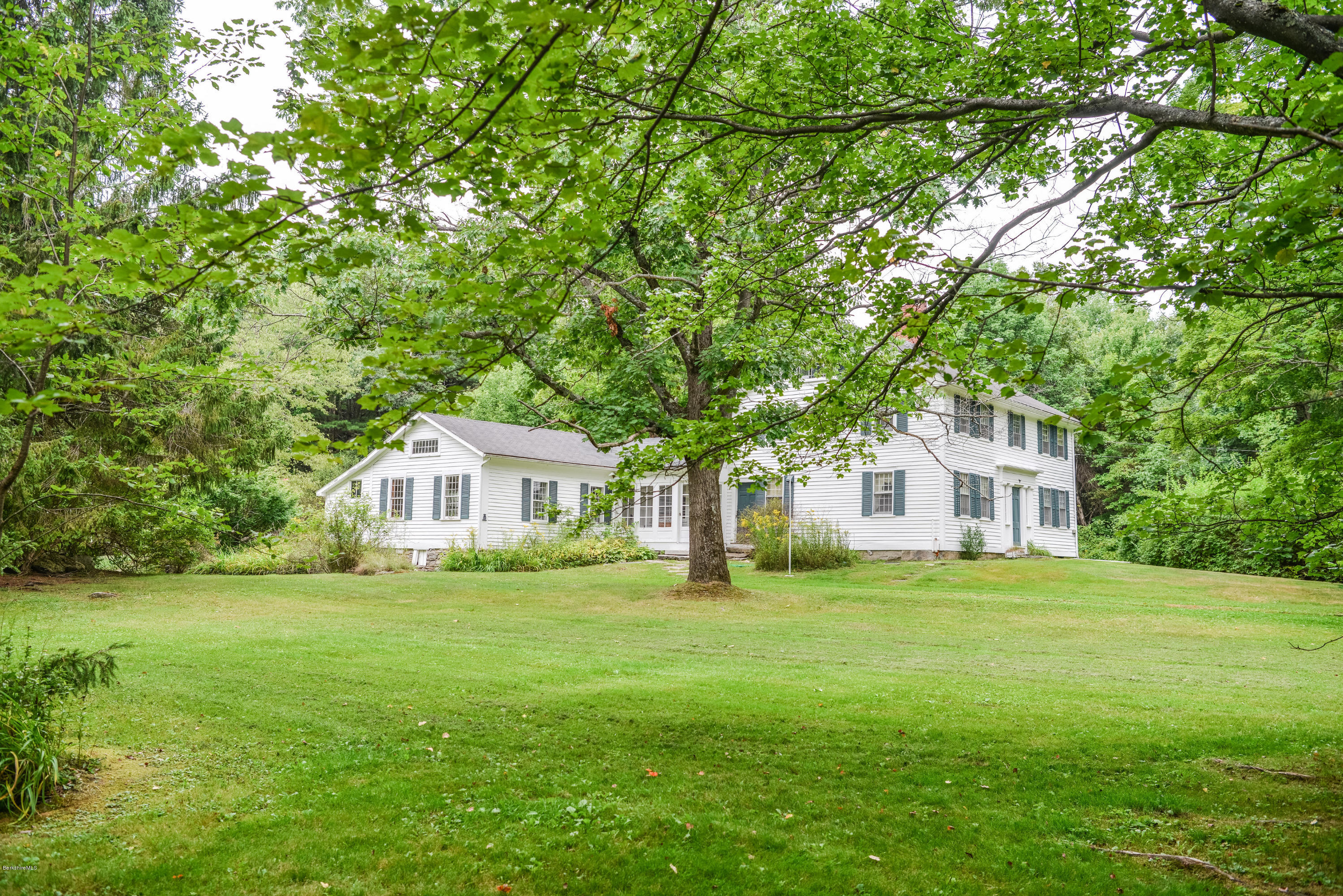 191 North Beech Plain Road Sandisfield, MA 01255 - Photo 4 of 54 a front view of a house with a garden