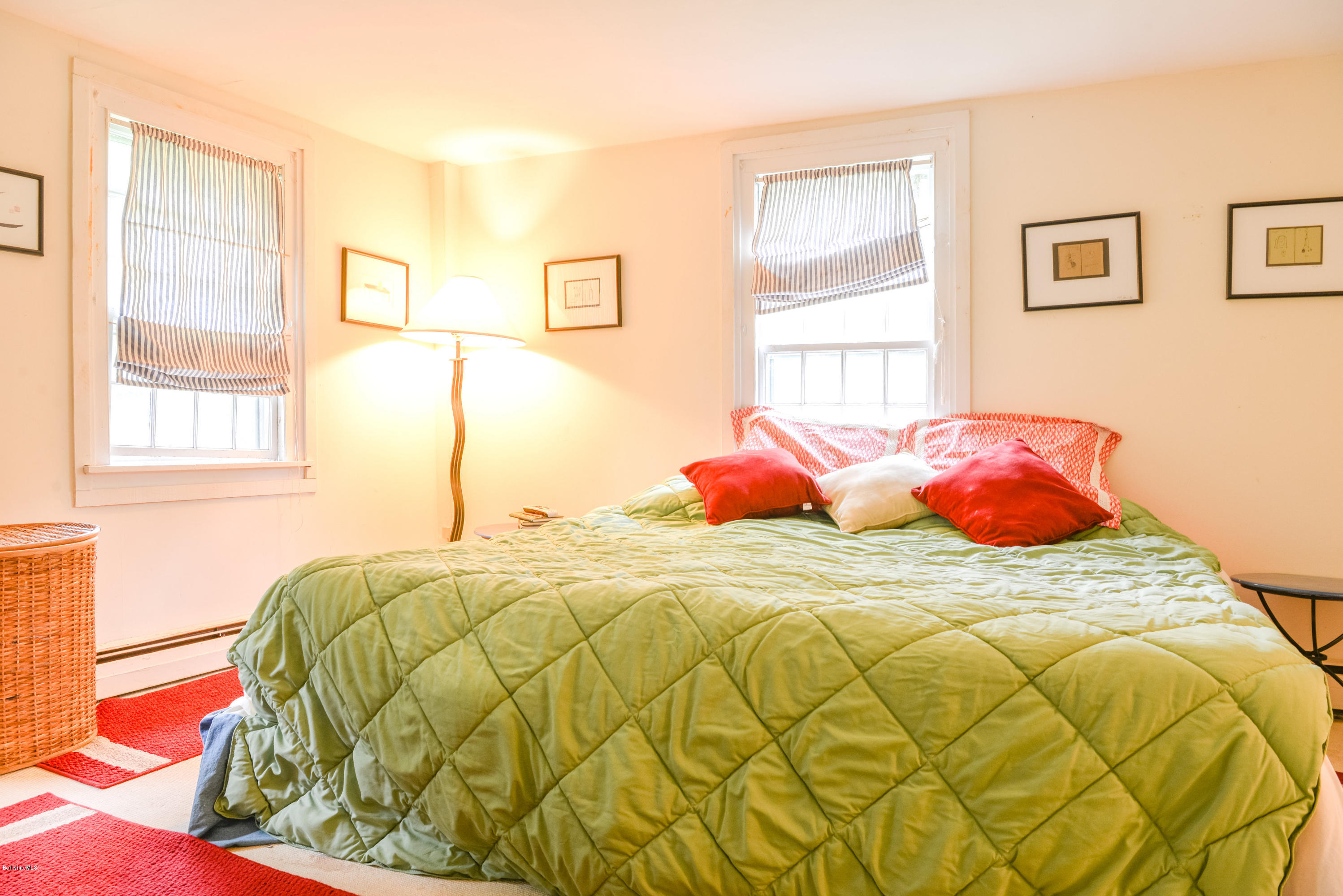 191 North Beech Plain Road Sandisfield, MA 01255 - Photo 39 of 54 a bedroom with a bed and wooden floor