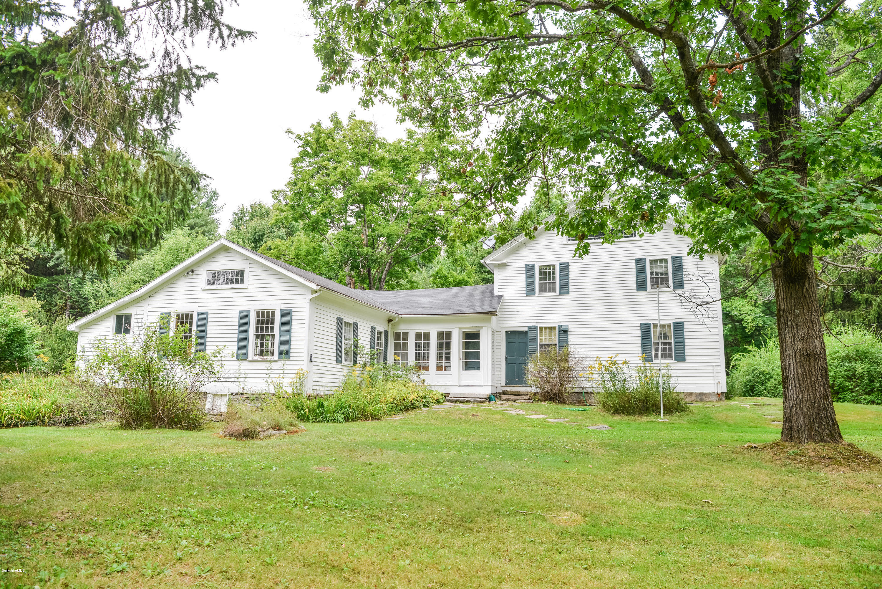 191 North Beech Plain Road Sandisfield, MA 01255 - Photo 5 of 54 a front view of a house with a garden