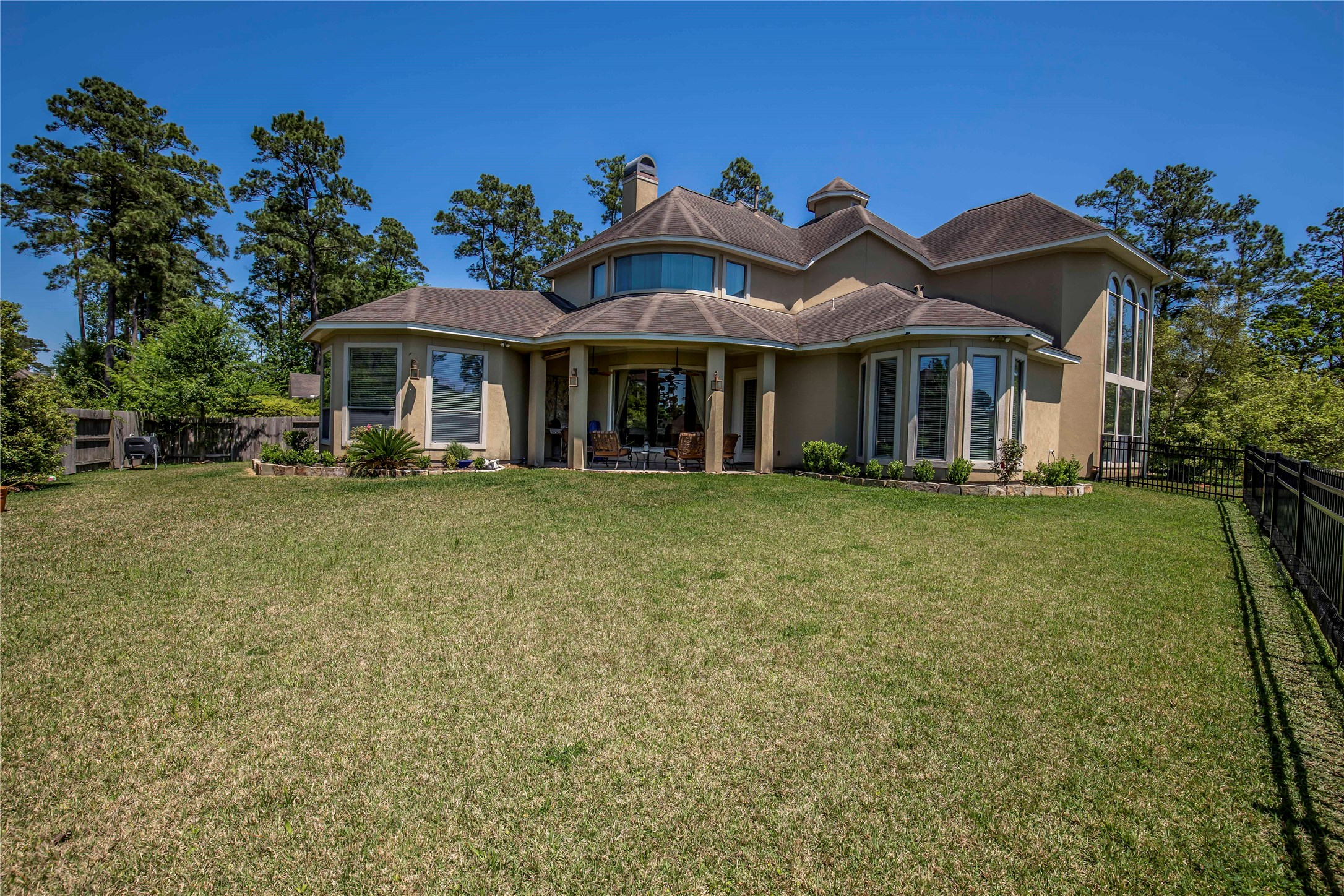 25219 Hideaway Run Drive Spring, TX 77389 - Photo 6 of 45 a front view of a house with a garden