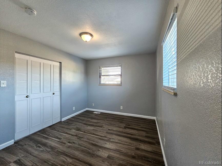 5542 Scranton Street Denver, CO 80239 - Photo 13 of 36 a view of room and window