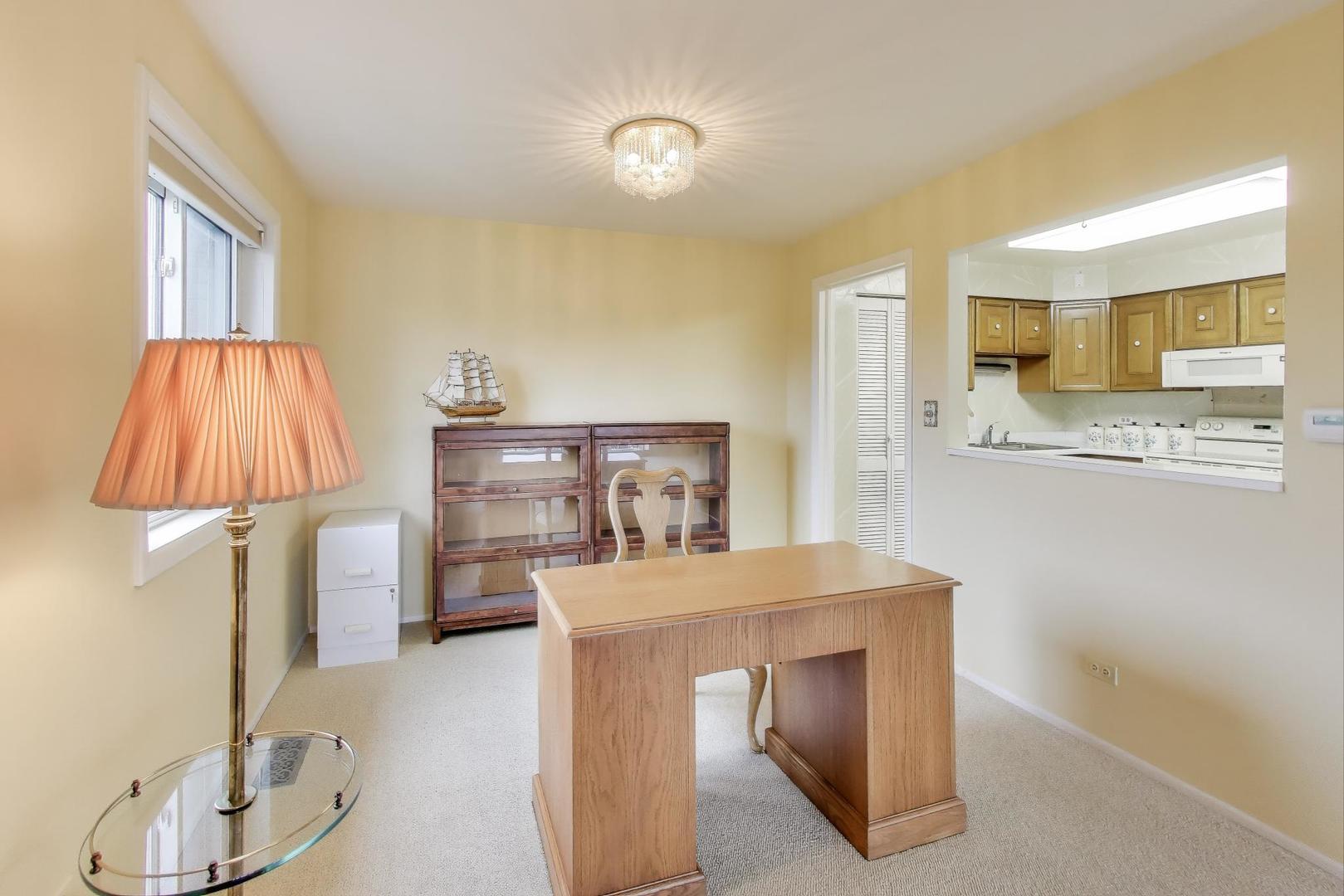 828 Oakton Street, Unit 5F Evanston, IL 60202 - Photo 12 of 37 a utility room with washer and dryer