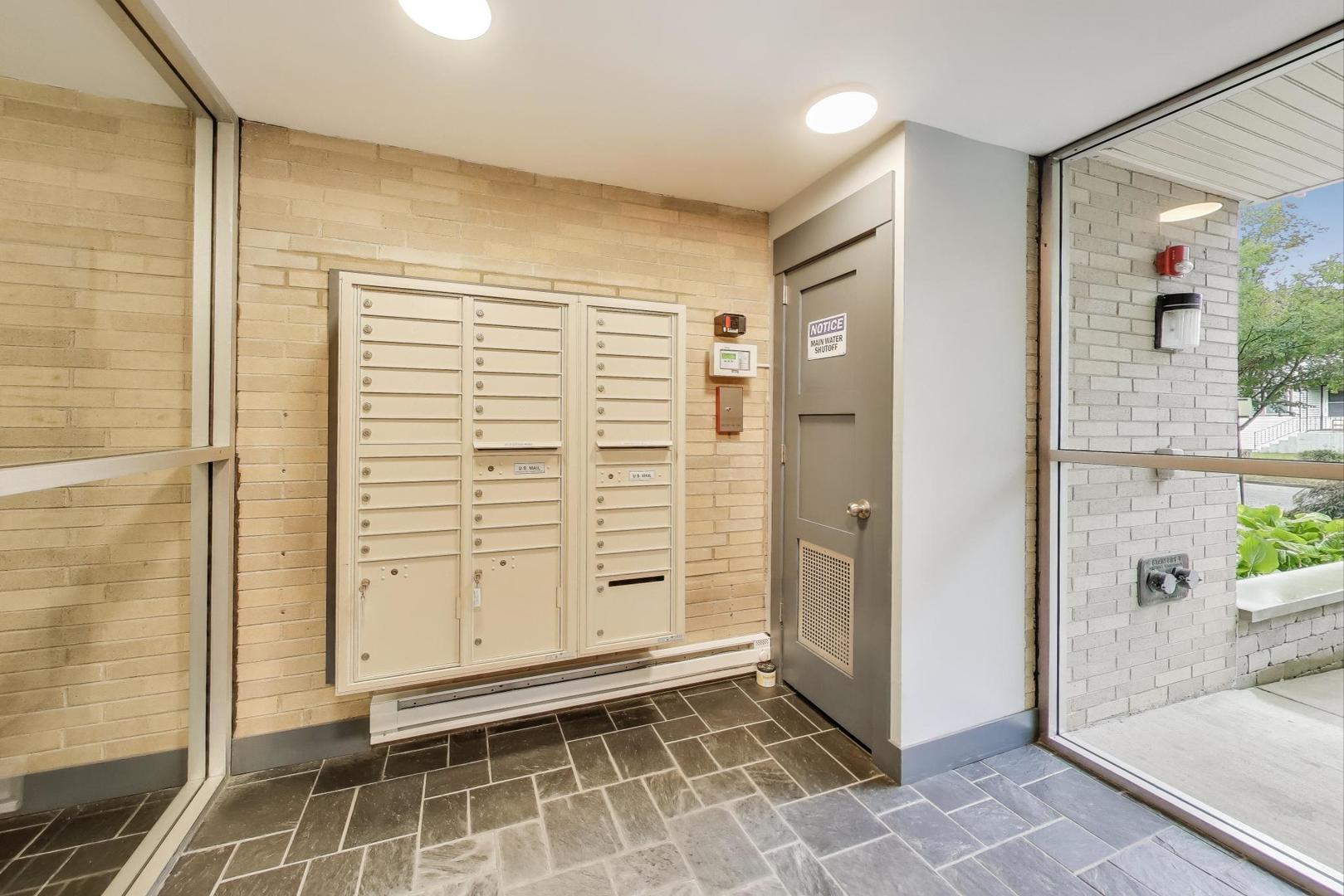 828 Oakton Street, Unit 5F Evanston, IL 60202 - Photo 5 of 37 workspace with wooden floor and windows