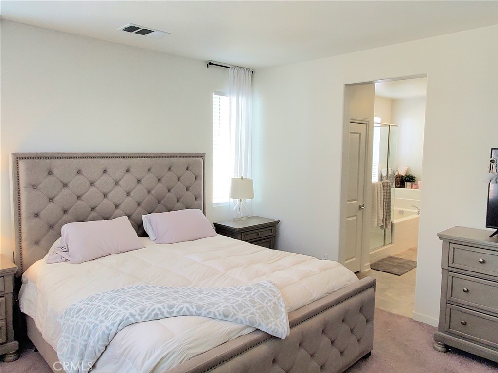 16229 Castello Lane, Unit 6 Fontana, CA 92336 - Photo 13 of 36 Primary Suite