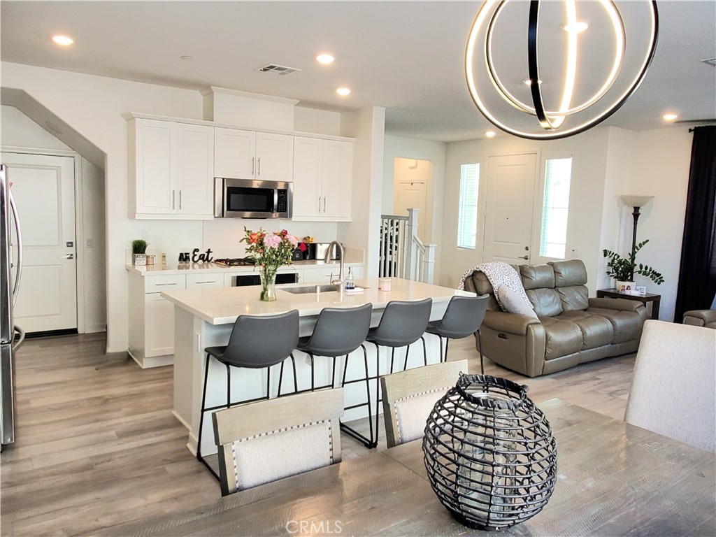 16229 Castello Lane, Unit 6 Fontana, CA 92336 - Photo 8 of 36 Spacious Kitchen with Breakfast Bar