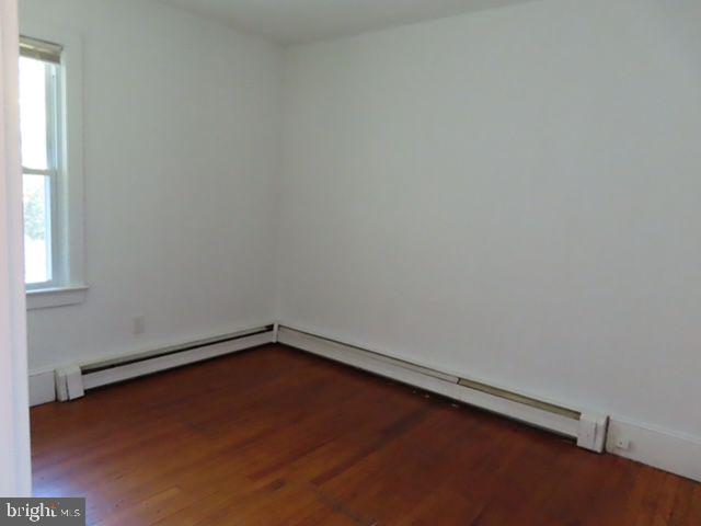 9 Frazier Street Burlington, NJ 08016 - Photo 12 of 33 a view of a small space with wooden floor and a window