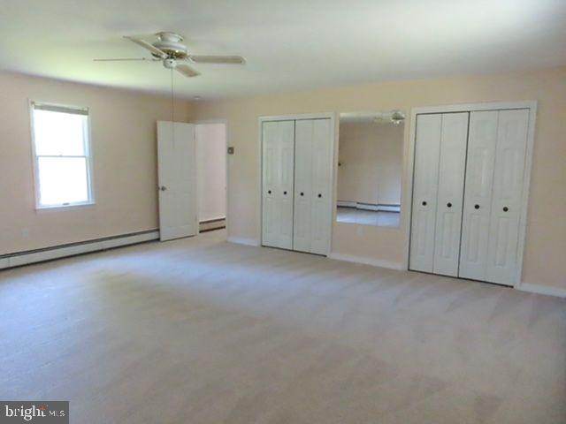 9 Frazier Street Burlington, NJ 08016 - Photo 18 of 33 a view of empty room with windows and ceiling fan