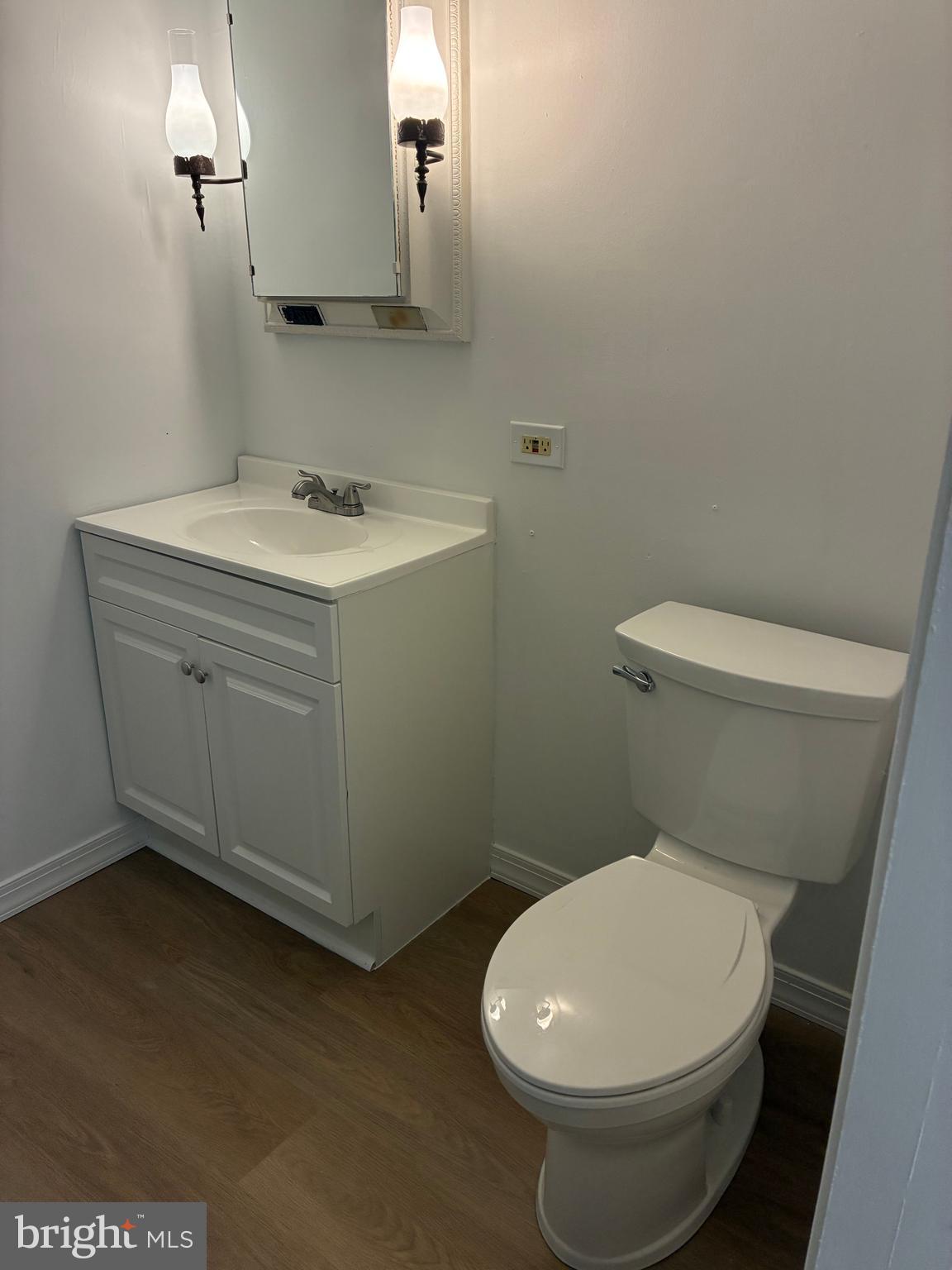 9 Frazier Street Burlington, NJ 08016 - Photo 20 of 33 a bathroom with a toilet sink and mirror