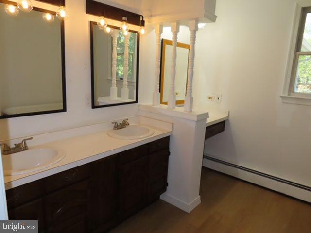 9 Frazier Street Burlington, NJ 08016 - Photo 22 of 33 a bathroom with a sink and a mirror