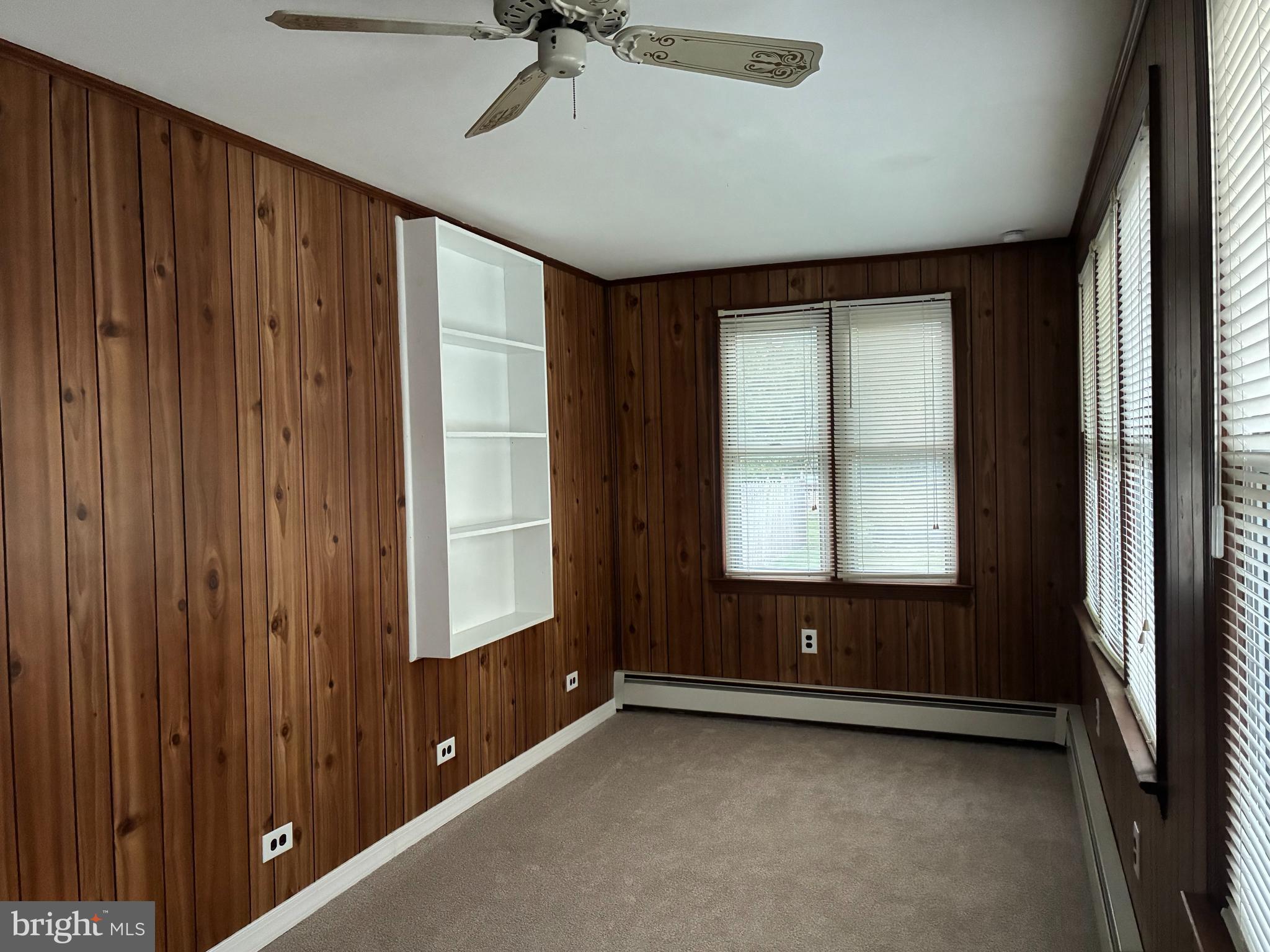 9 Frazier Street Burlington, NJ 08016 - Photo 4 of 33 a view of an empty room with a window and a dresser