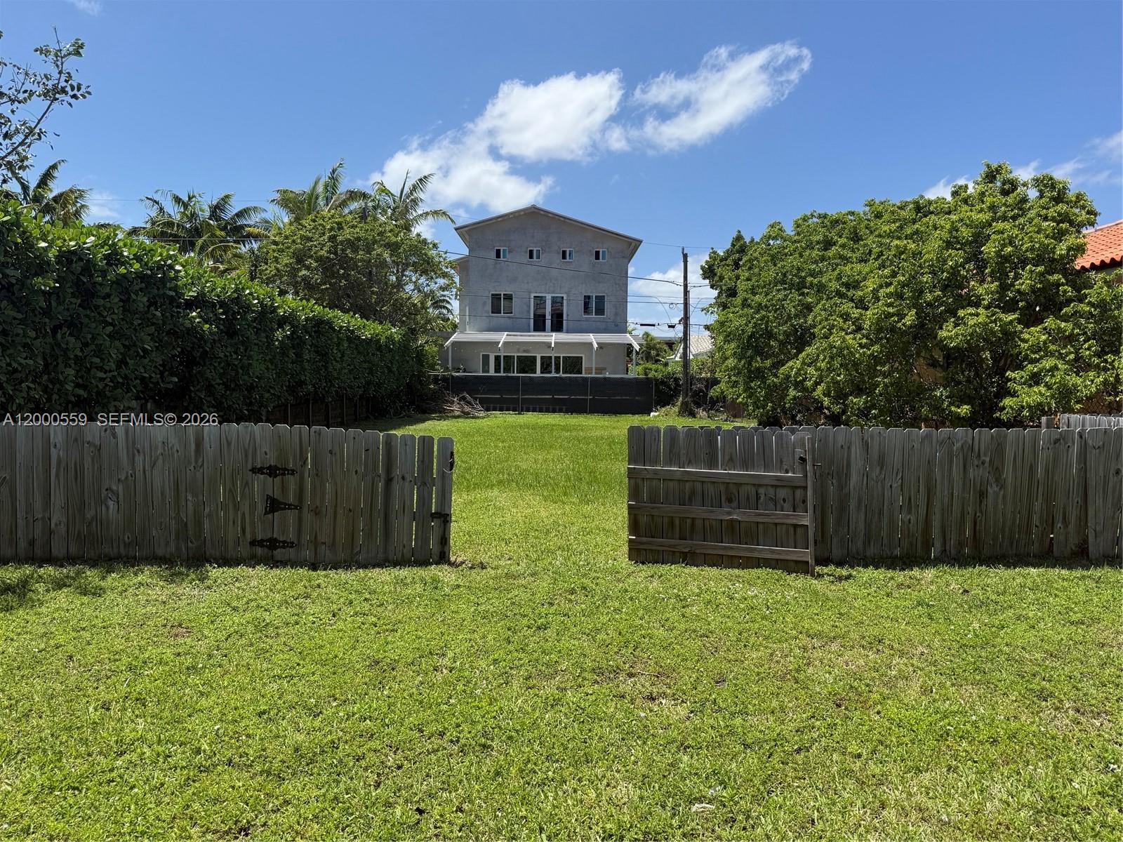 a house view with a garden space