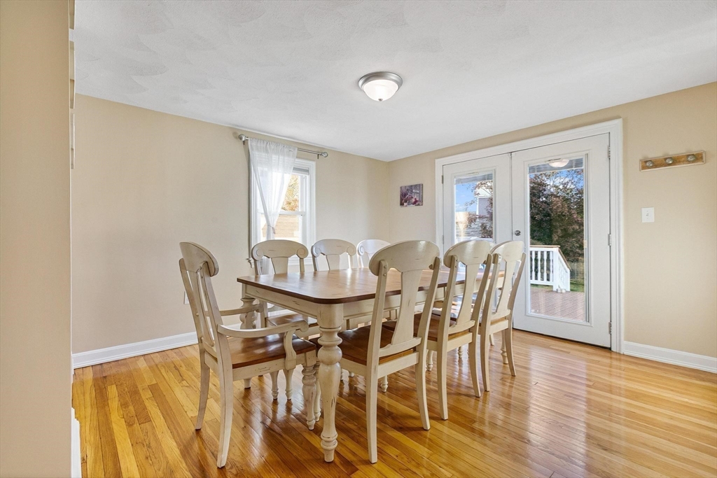 26 Bates Street Danvers, MA 01923 - Photo 15 of 42 a view of a dining room with furniture and wooden floor