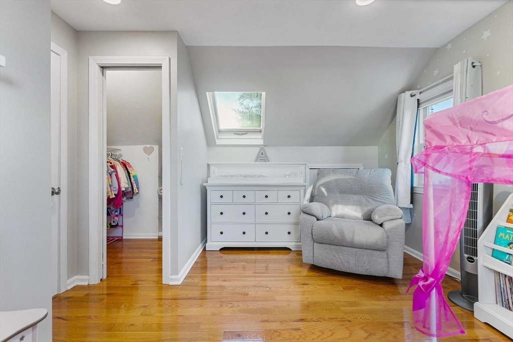 26 Bates Street Danvers, MA 01923 - Photo 20 of 42 a living room with furniture and a flat screen tv