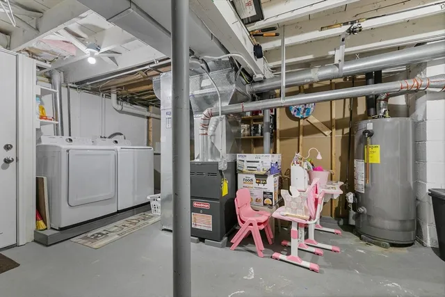 a storage room with lots of furniture and clutter